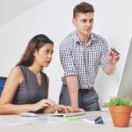 man and woman discussing